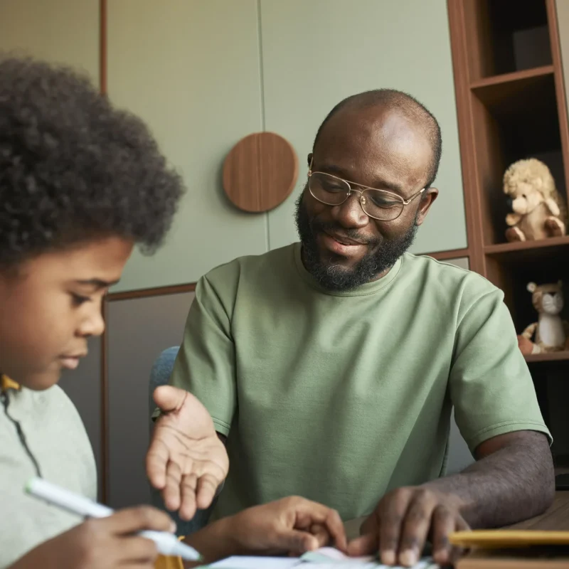 close-up-man-kid-doing-homework (1)